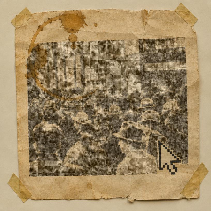 Yellowed newspaper clipping of a crowd with a pixel cursor